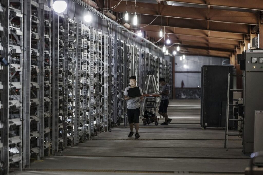 Bloomberg - cryptocurrency mining machines at a facility in Ordos